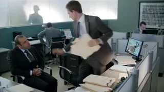 man in suit giving office presentation — Suits