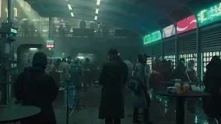 busy street scene in city at night — Blade Runner 2049