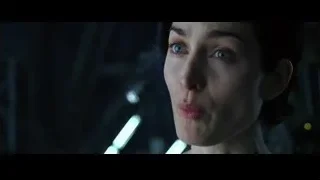 woman's face looking directly at camera — The Matrix