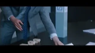 Two men in suits in office — The Big Short