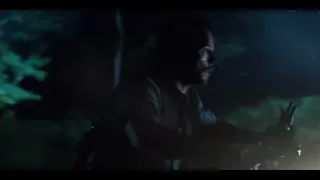 man with microphone in dark room — Jurassic World