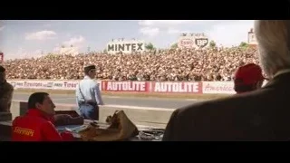 man addressing crowd at race track — Ford v Ferrari