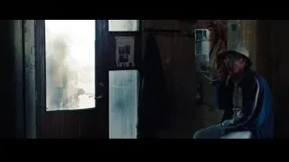 Man on phone in dimly lit room — The Secret Life of Walter Mitty