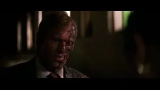 Bloody man in suit in dark room — Batman: The Dark Knight