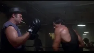 two men sparring in boxing ring — Rocky III