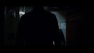 woman looking at paper in hallway — Steve Jobs