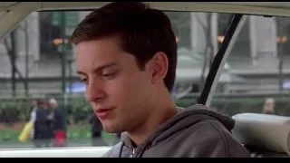 young man in car looking out window — Spider Man