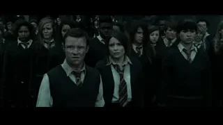 Young people in school uniforms in line — Harry Potter and the Deathly Hallows 2