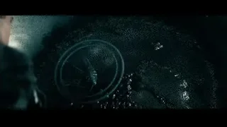 man sitting in dark room with spaceship — Superman: Man of Steel