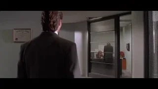 man in suit in office hallway — American Psycho