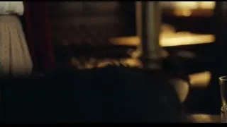 woman in dimly lit room — Peaky Blinders