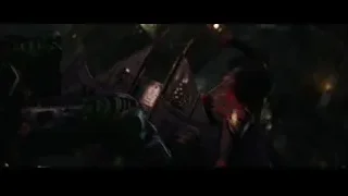 robot in red black suit lying on back — Spiderman: No Way Home
