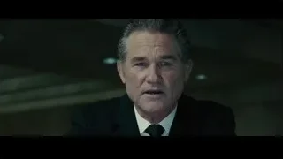 older man serious expression in dimly lit room — Furious Seven