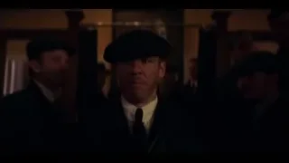 man in beret speaking into microphone — Peaky Blinders