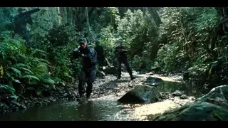 soldiers walking through forest stream — Jurassic World