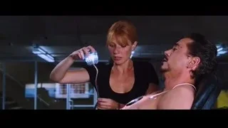 man and woman medical exam futuristic room — Iron Man