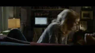 Woman sitting on couch with man — The Amazing Spider Man