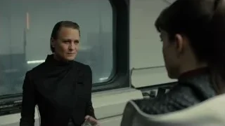 man and woman in futuristic cityscape — Blade Runner 2049