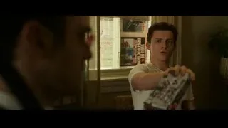 young man holding remote control — Spiderman: No Way Home