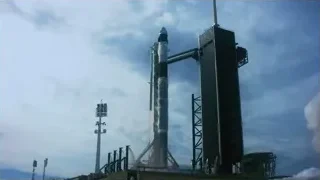 Rocket launching from pad with flames — Elon Musk: Return to Space