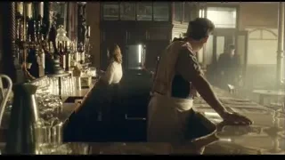 man and woman pouring drink in dimly lit bar — Peaky Blinders