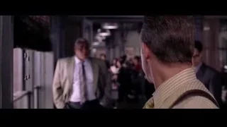 men in dimly lit room — Spider Man 2