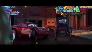 Cars on street at night with neon signs — Cars