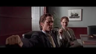two men talking in office — American Psycho