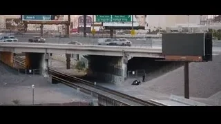 highway with large billboard and bridge — The Big Short
