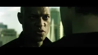 close-up of man's serious face — The Matrix