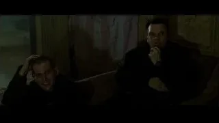two men on couch in dimly lit room — Fight Club