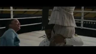 Two men embracing in stadium — Creed 3