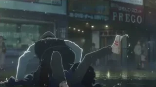 person lying on ground at store — Weathering with You