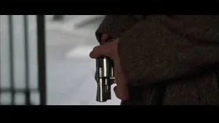 close-up of hand holding revolver — Batman