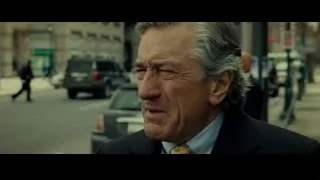 older man in suit on busy street — Limitless