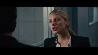 woman with blonde hair in dark room — Now You See Me