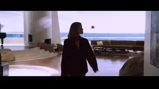 woman in modern living room with ocean view — Iron Man