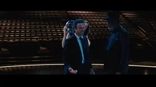 three men in suits on stage with trophy — Now You See Me