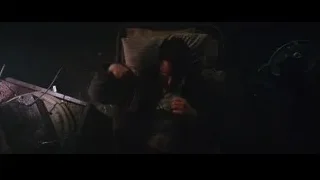 man sitting in dark room — Iron Man