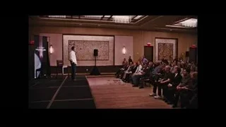 Man giving presentation in conference room — The Wolf Of Wall Street