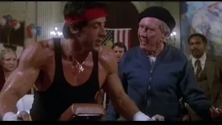 two men fighting — Rocky III