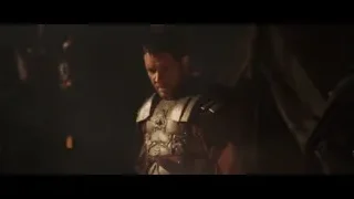 Man in medieval armor with soldiers — Gladiator