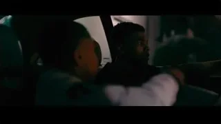 Two men sitting in car at night — Creed 3