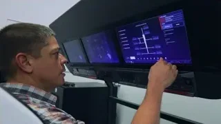 man in control room looking at screens — Elon Musk: Return to Space