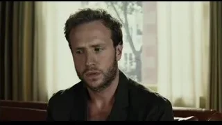 Man in black blazer sitting on couch — Life of Pi
