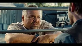 two men conversing on balcony — Jurassic World