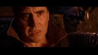 Man with serious expression in dark eerie scene — Spider Man 2