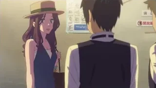 Three people in front of poster — Your Name