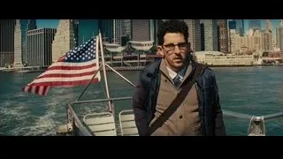 Man on boat deck with city skyline — Now You See Me