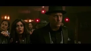 man and woman with gun in red lantern room — Now You See Me 2